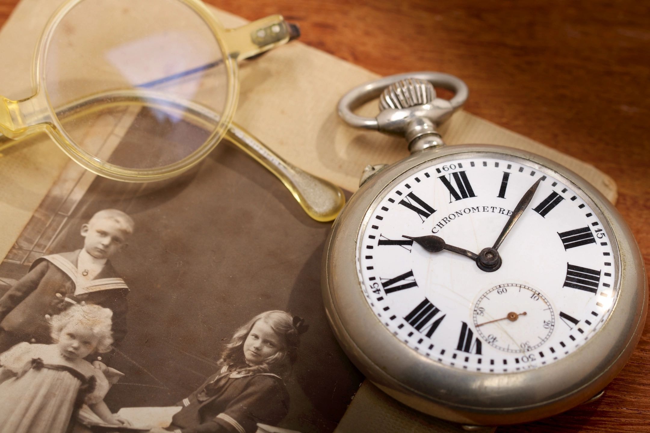 Pocket watch and glasses